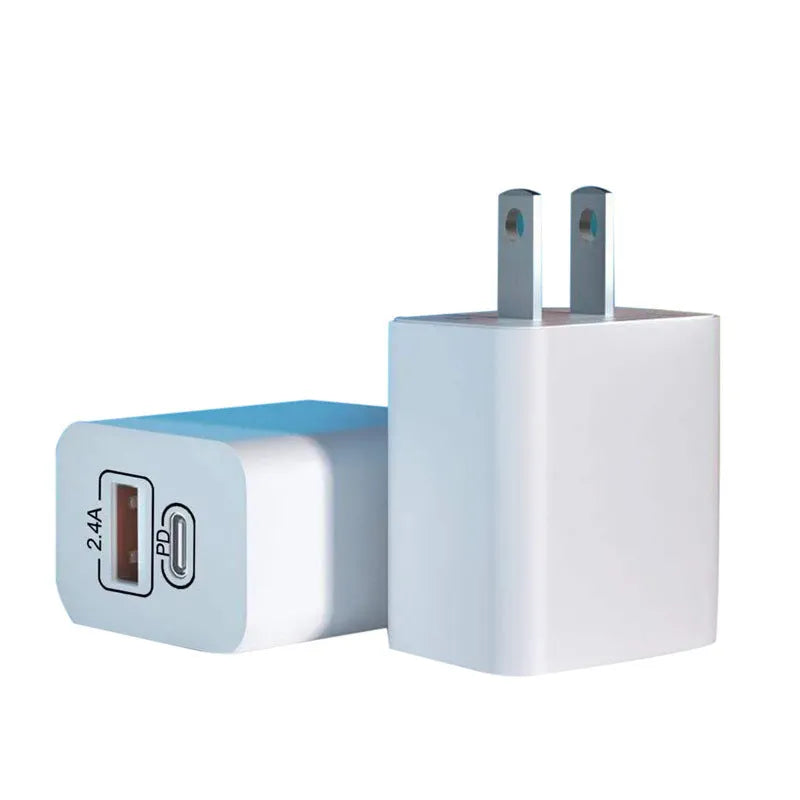 USB travel charger with bare metal finish showing multiple plug options for international use