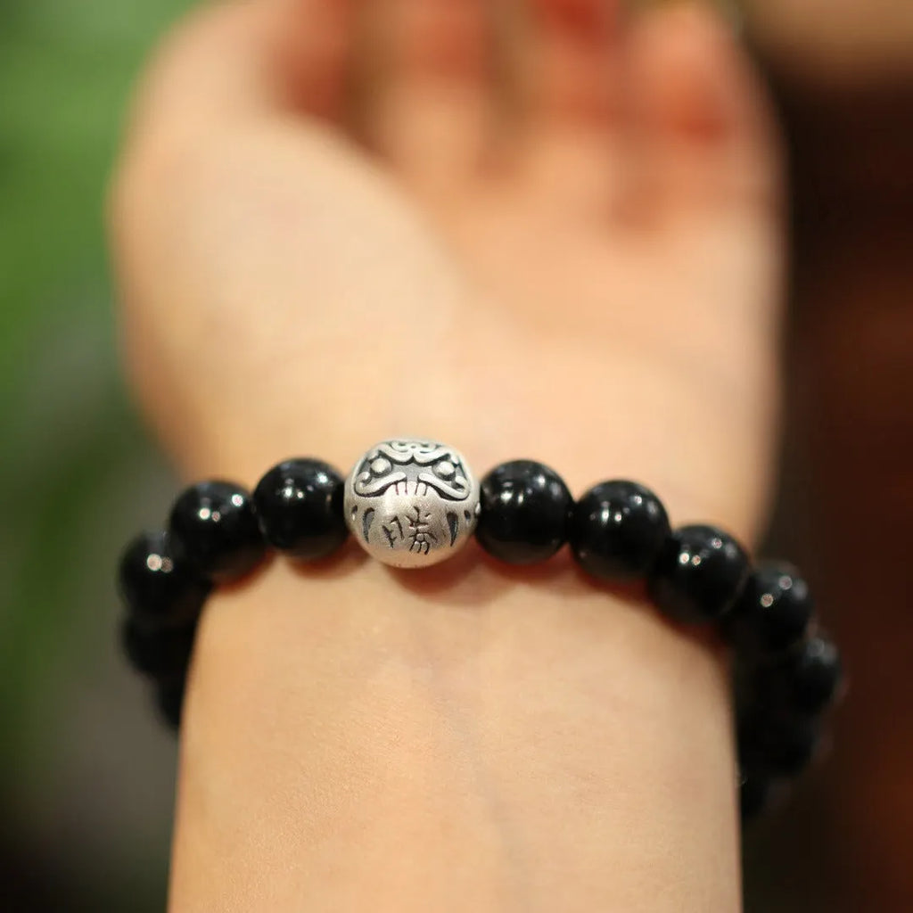 Black agate bracelet with 10mm beads and sterling silver components in Chinese style design