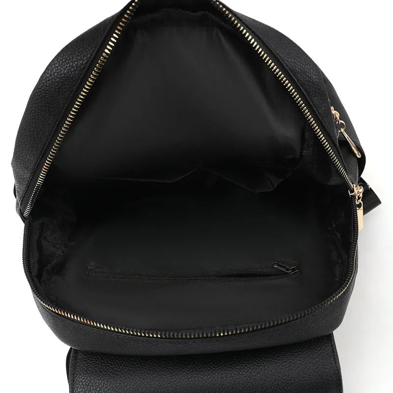 Casual black PU leather women's backpack with a three-dimensional front pocket.
