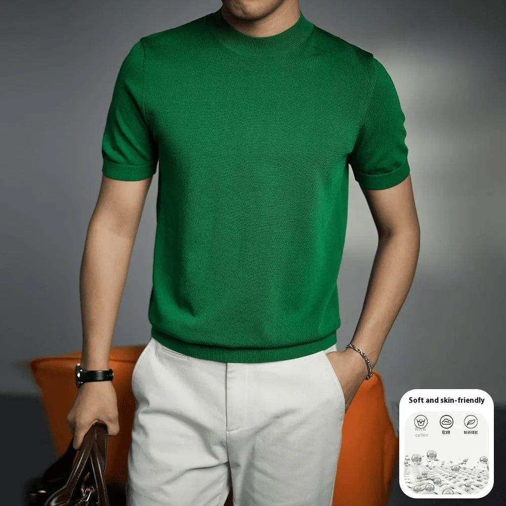 Man wearing a silver grey knitted round neck t-shirt with short sleeves.