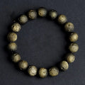 Natural obsidian crater ball bracelet with grinding texture in silver or golden meteorite colours