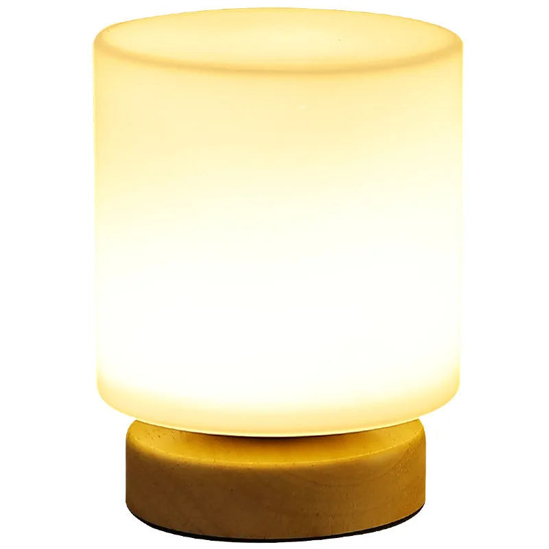 Nordic style solid wood USB table lamp in a white geometric shape with touch dimming.