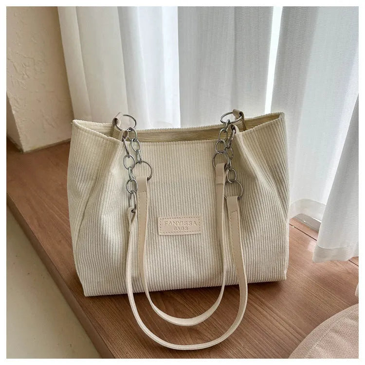 Corduroy one-shoulder tote handbag in square design with three-dimensional pocket