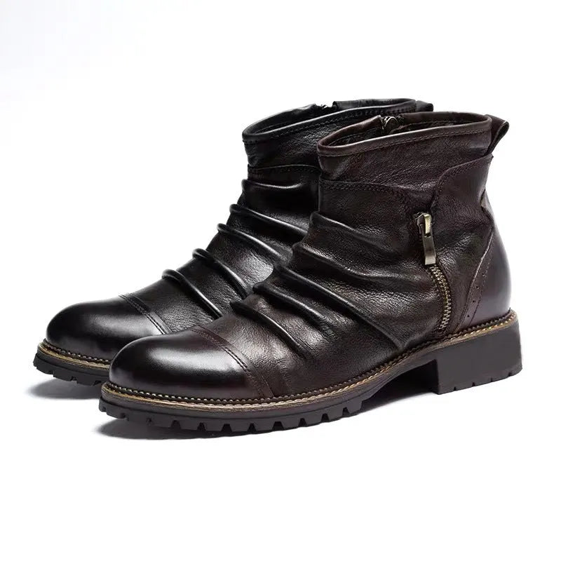 Black side-zip cowboy boot with round toe and a mid-height horseshoe heel on a plain background.