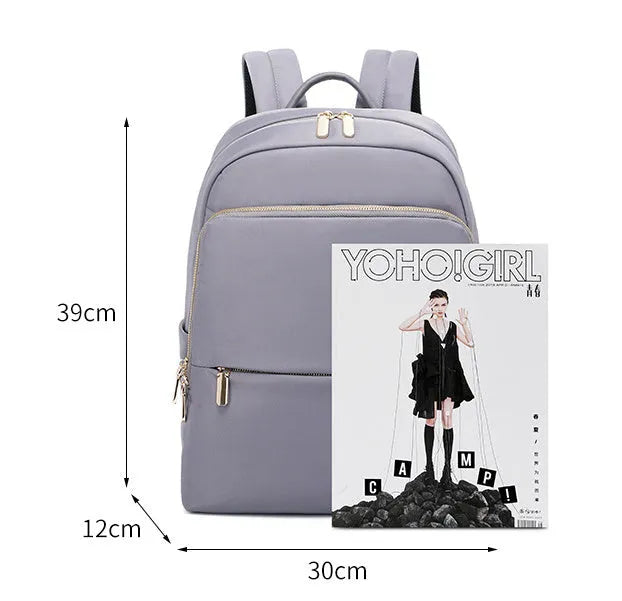 Women's Oxford cloth backpack in black or grey with large capacity and anti-theft features