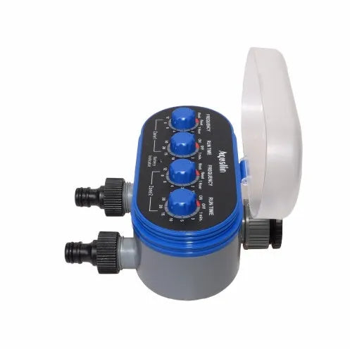Dual timed irrigation controller with battery compartment and water connection ports