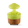 Wood grain white rain cloud shaped humidifier diffuser with coloured LED lights on a table