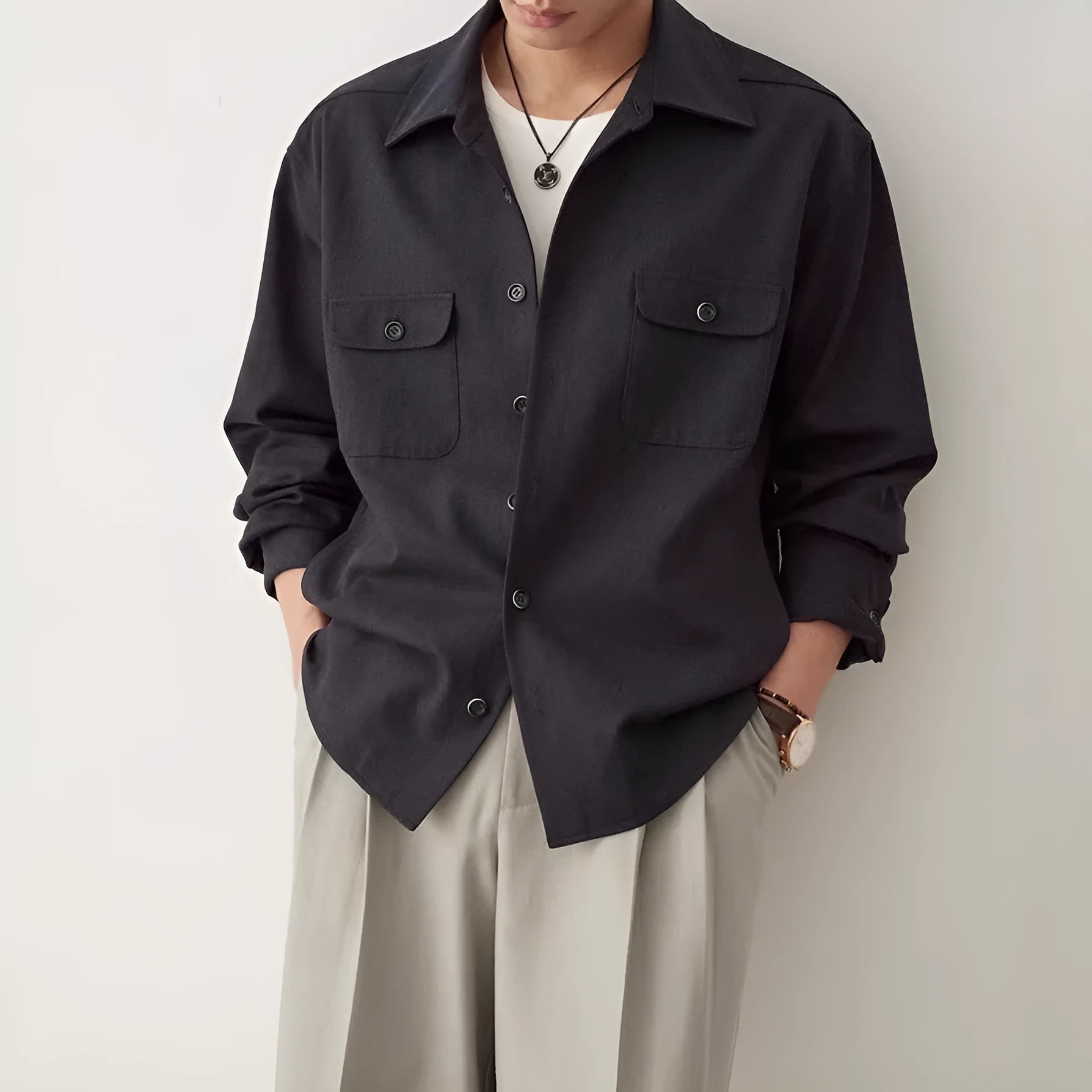 Men's long sleeve lapel collar shirt in chemical fibre blend fabric, shown in light sand rice colour.