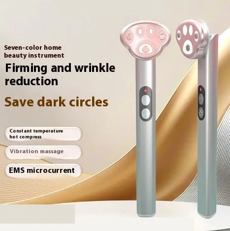 Gradient pink inductive micro-current eye massager with vibration settings and colour light.