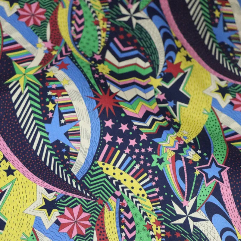 Blue floral digital print on 100% cotton fabric showing a 145cm wide by 1m long piece.