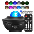 Black parallel style starry sky projection lamp with Bluetooth and remote control on a desktop