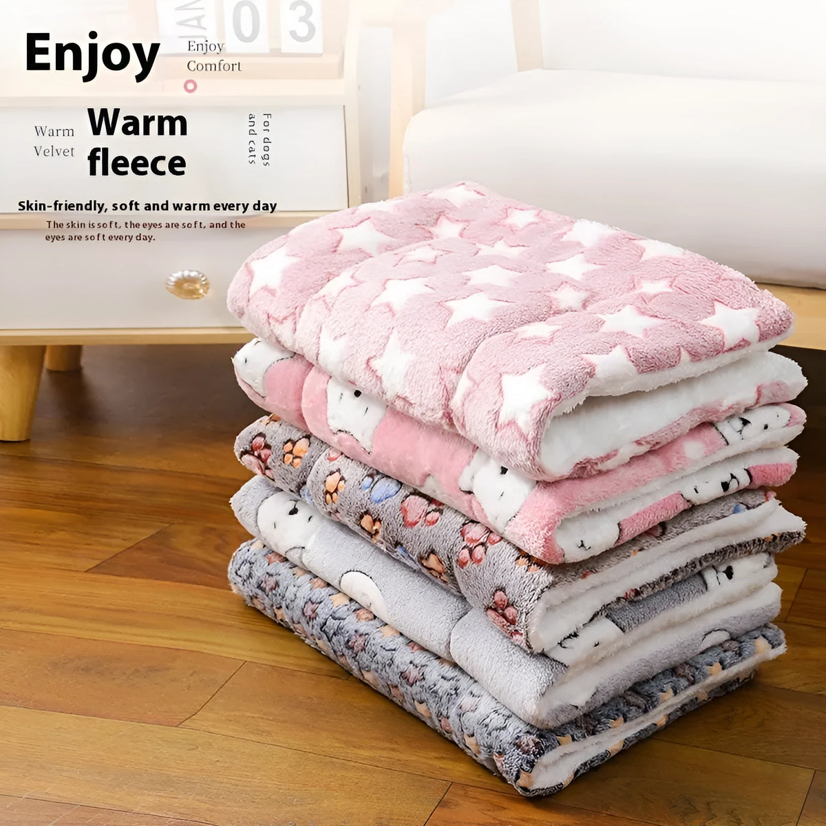 Thickened cloth pet floor mat for dogs and cats in autumn and winter, shown in a blue starry sky pattern