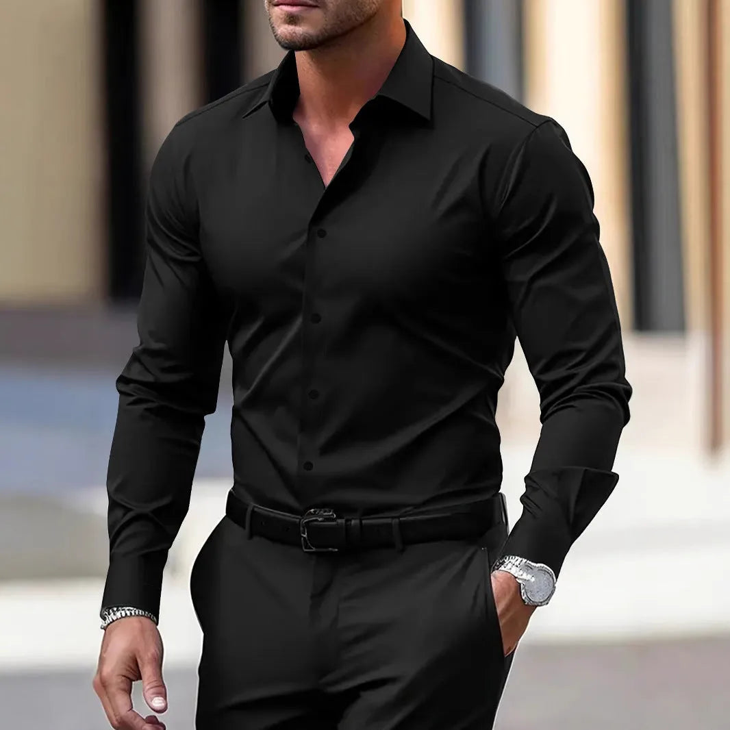 Men's solid colour velvet button down shirt in navy blue with long sleeves and lapel collar
