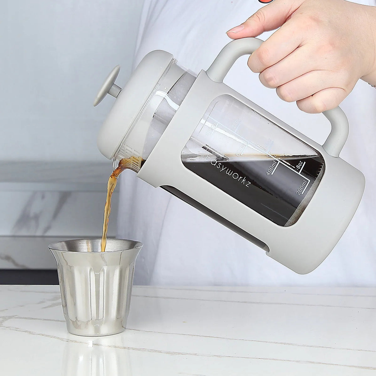 1000ml glass French press coffee maker with brewing filter and tea infuser, shown in black or light gray.