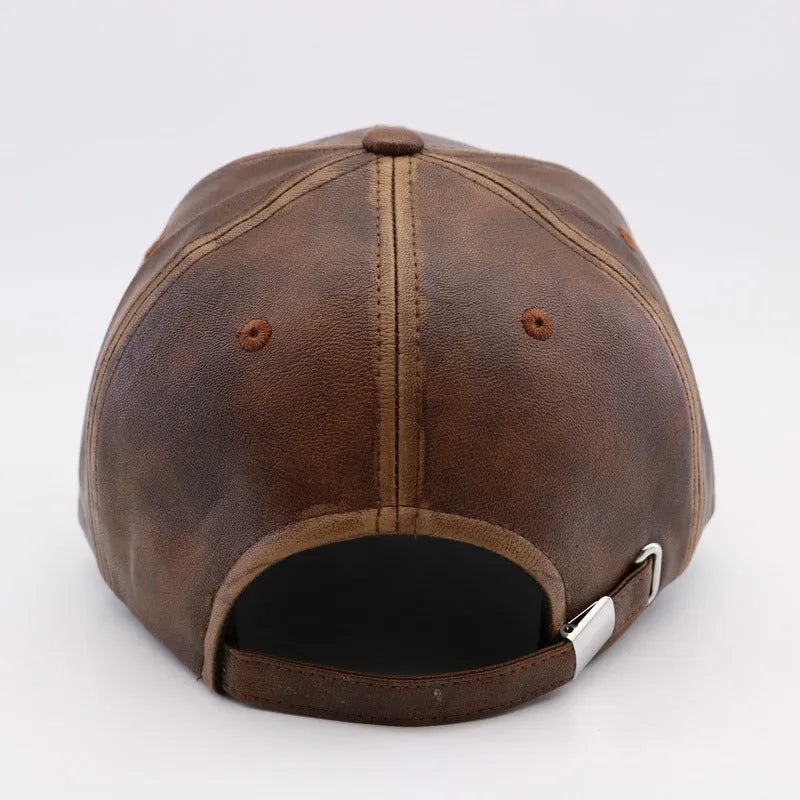 Washed and worn PU baseball cap with hard top peak, adjustable dome crown, brown colour, street travel fashion