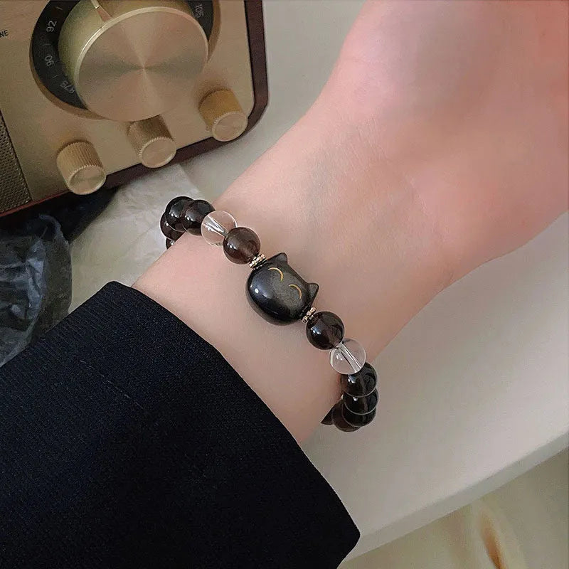 Women's natural opal cat head bracelet with Ice Stone finish and 8mm bead on silver tone chain