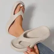Women's thick-soled EVA flip-flops in black, white or grey with non-slip patterned soles