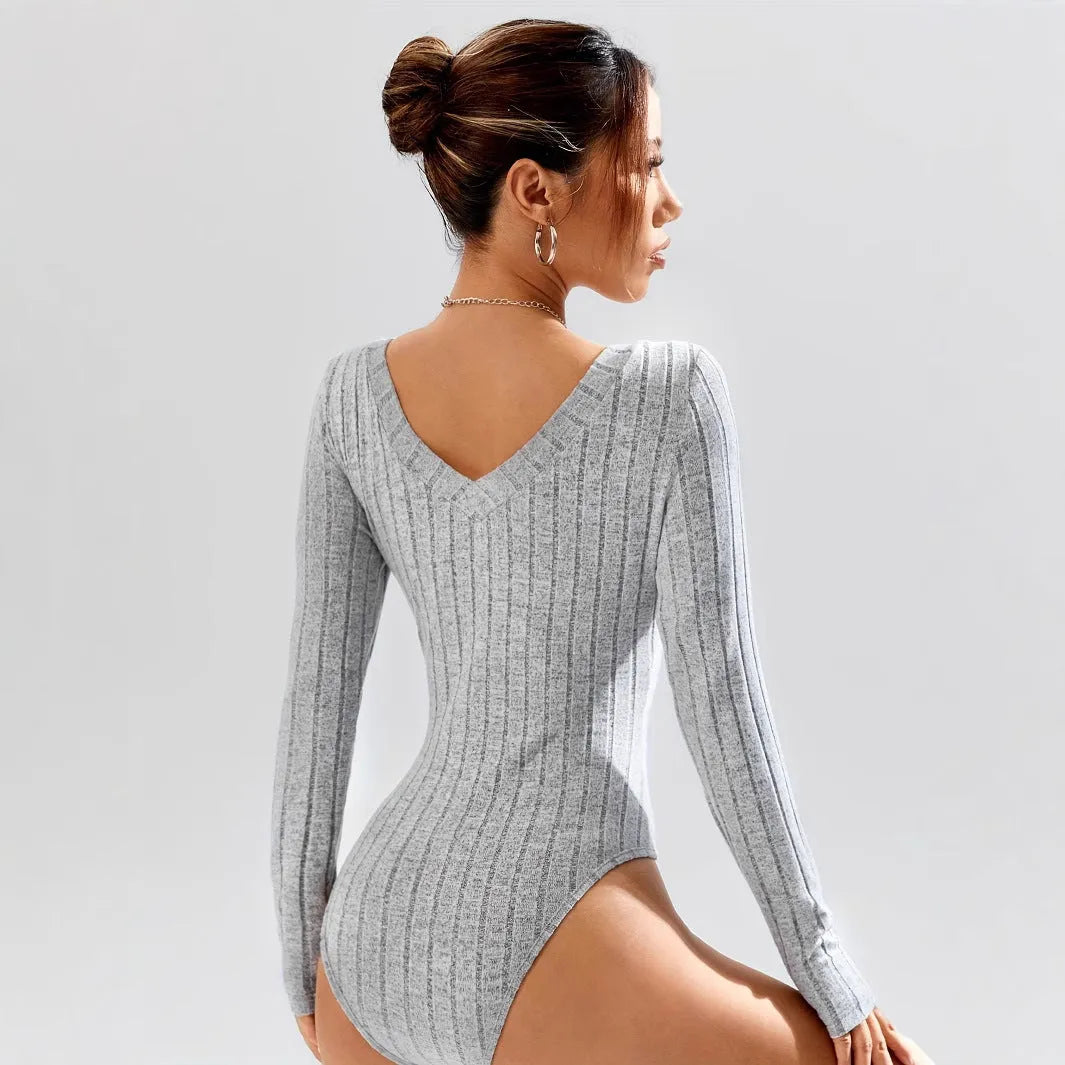 Women's deep V-neck long sleeve jumpsuit with shorts in solid light gray, black, or rose red, slim fit