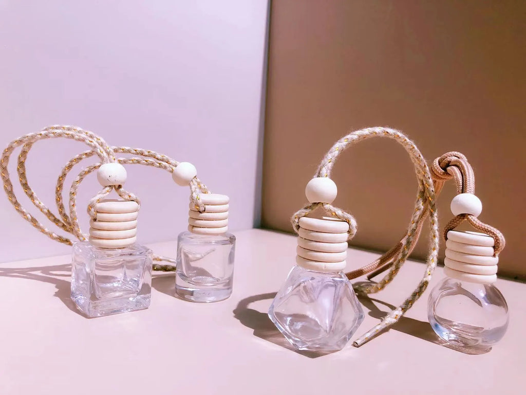 Car perfume pendant in glass with four style options for vehicle air freshening