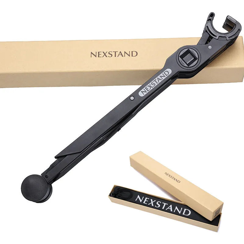 Black reinforced nylon folding laptop stand shown open in use and collapsed for storage.
