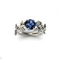 Zircon leaf engagement ring in electroplated metal, available in five colours and sizes 6 to 11