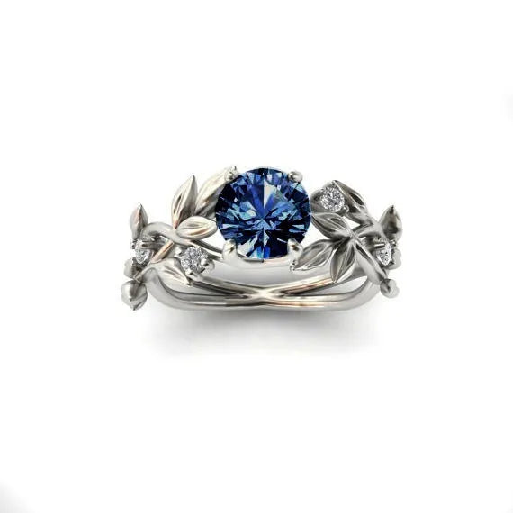 Zircon leaf engagement ring in electroplated metal, available in five colours and sizes 6 to 11