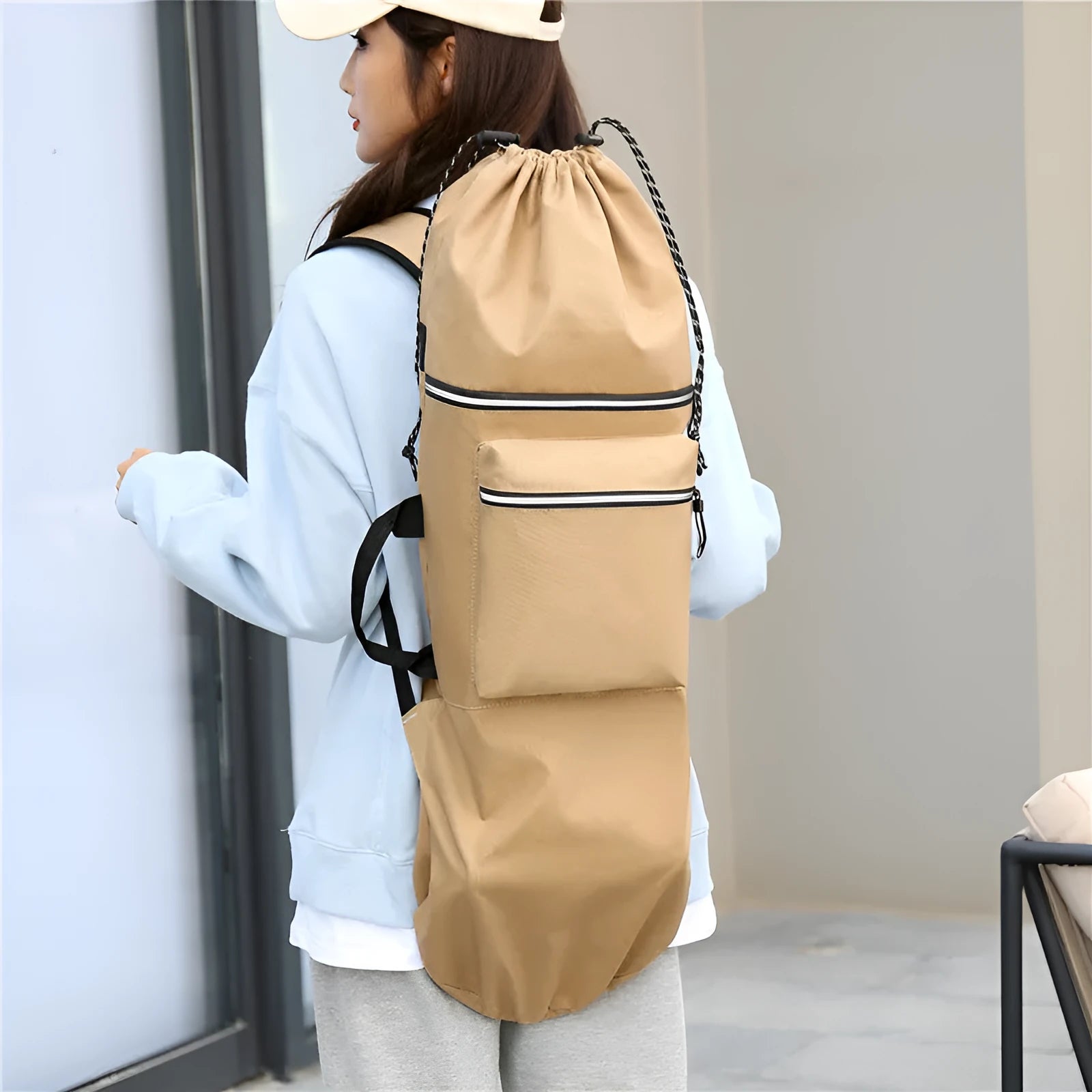 Waterproof nylon skate bag shown in camouflage colour with skateboard carrying capacity