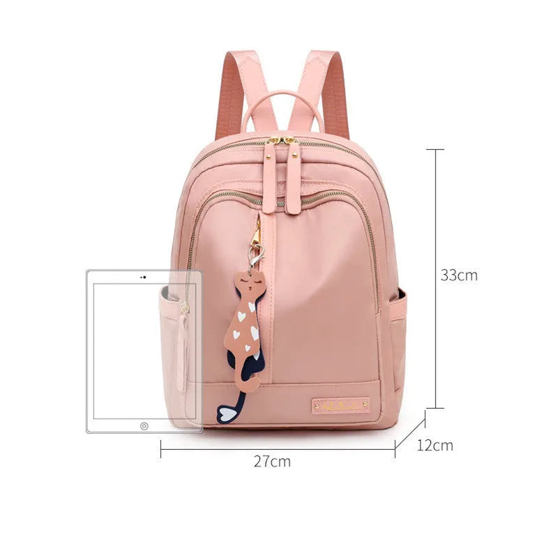 Women's black nylon casual backpack with double shoulder straps and front pocket