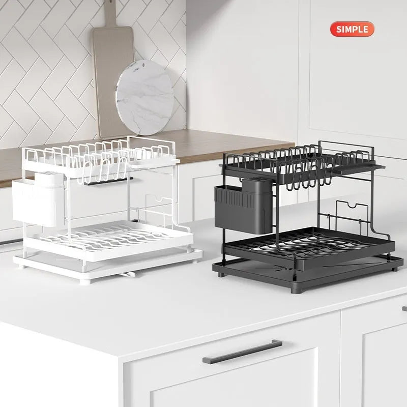White double-layer kitchen storage rack with removable draining tray on countertop
