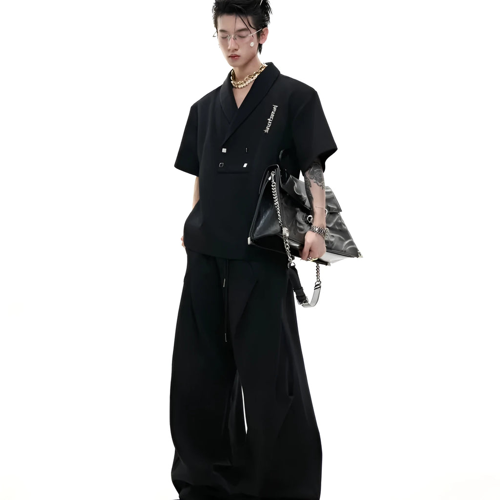 Men's dark grey V-neck cotton sports suit set with padded shoulders, metal embellishments, and matching shorts