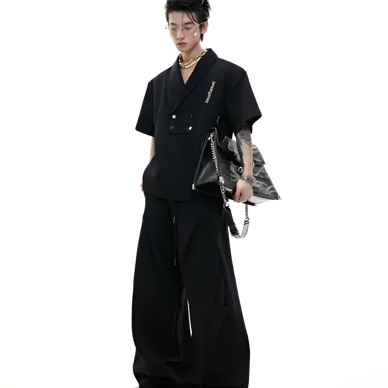 Men's dark grey V-neck cotton sports suit set with padded shoulders, metal embellishments, and matching shorts