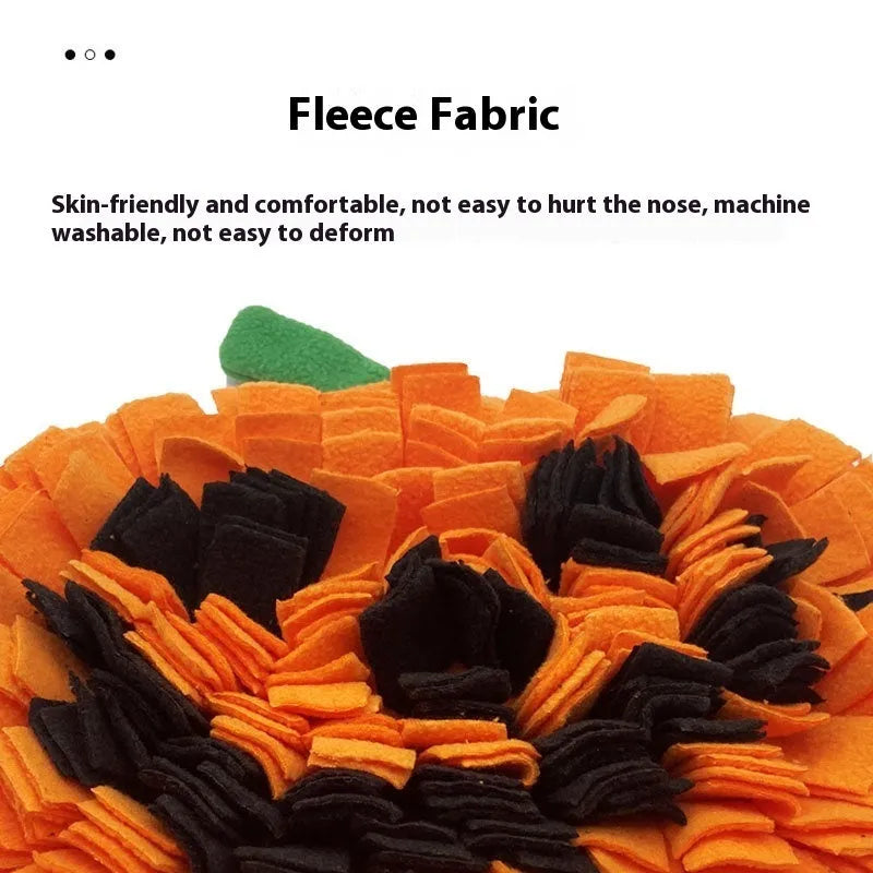 Orange pumpkin-shaped pet slow feeder mat with woollen pad on polar fleece.