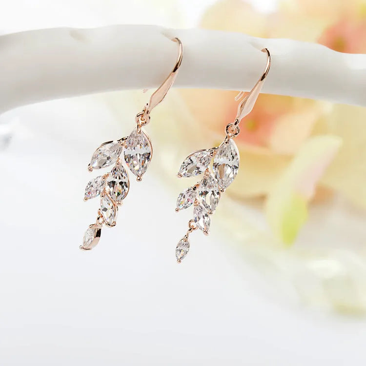 Fashion leaf earrings with zircon accents in coloured rose gold electroplating finish