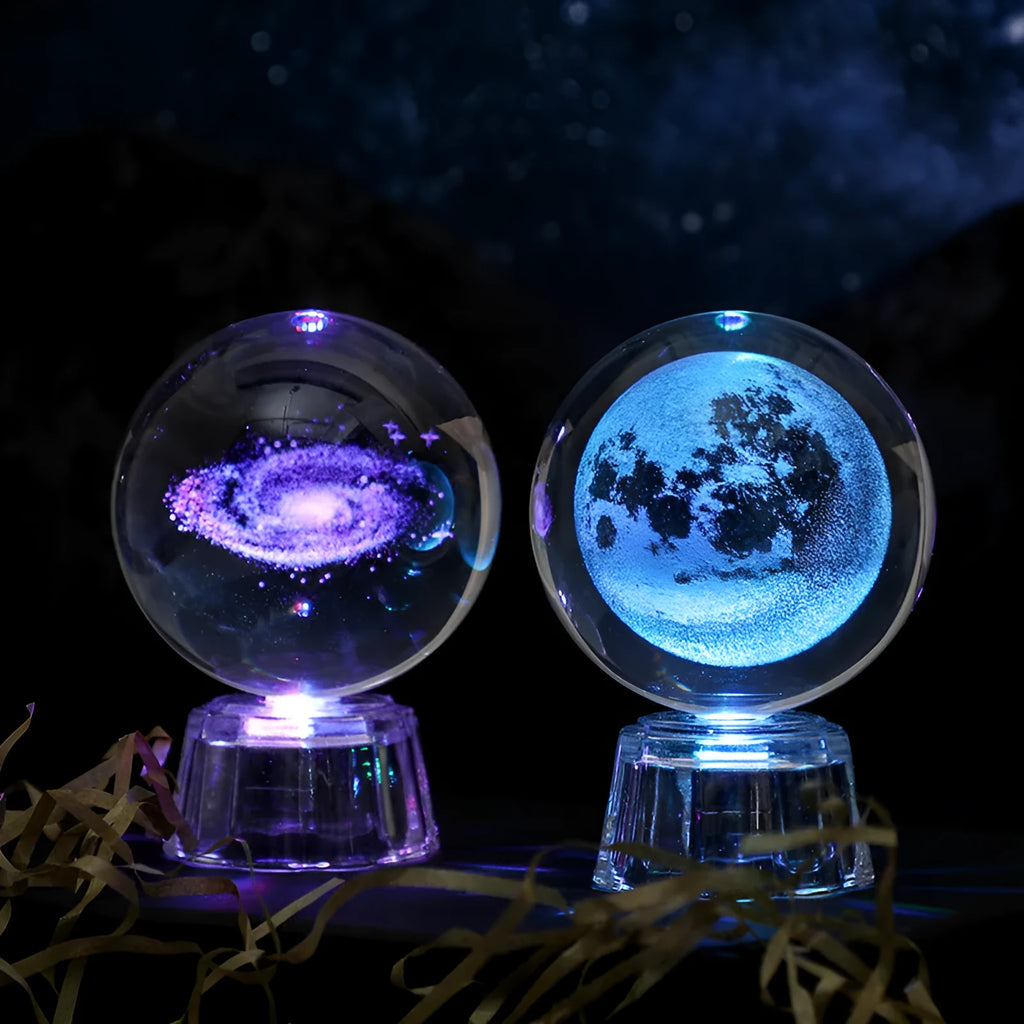 Transparent 6cm white crystal ball ornament with inner carving on a tabletop.