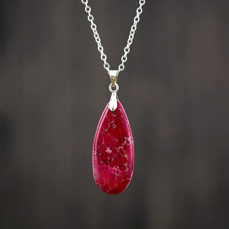 Jade water drop pendant on an 18K gold plated chain, showing hongjin colour finish.