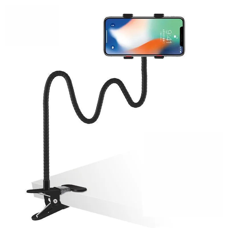 Black metal lazy stand gadget with rotary clip holding mobile phone on bedside table