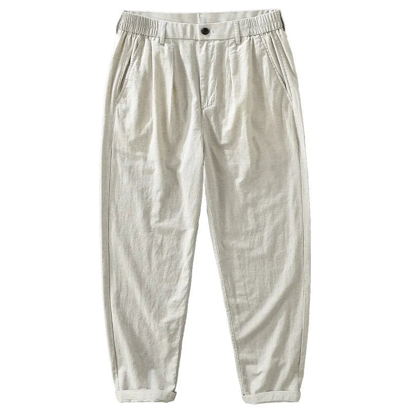 Men's loose straight-leg cotton linen trousers in brown displayed flat