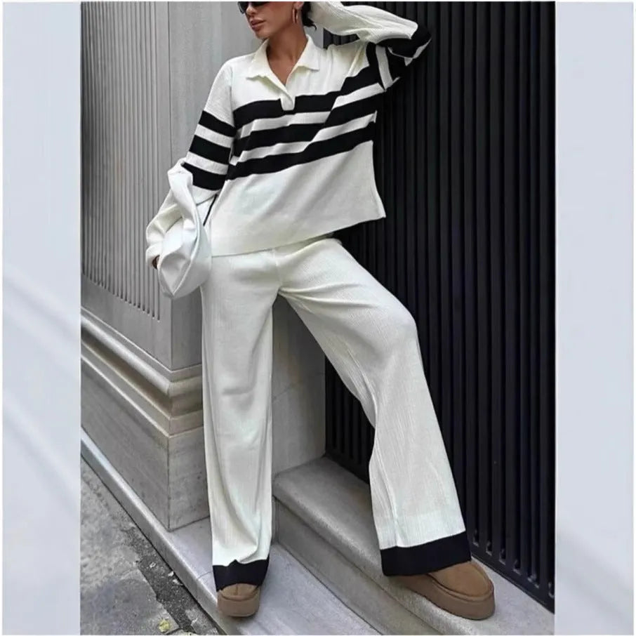 Women's black and white striped knitted two-piece set with polo collar top and trousers