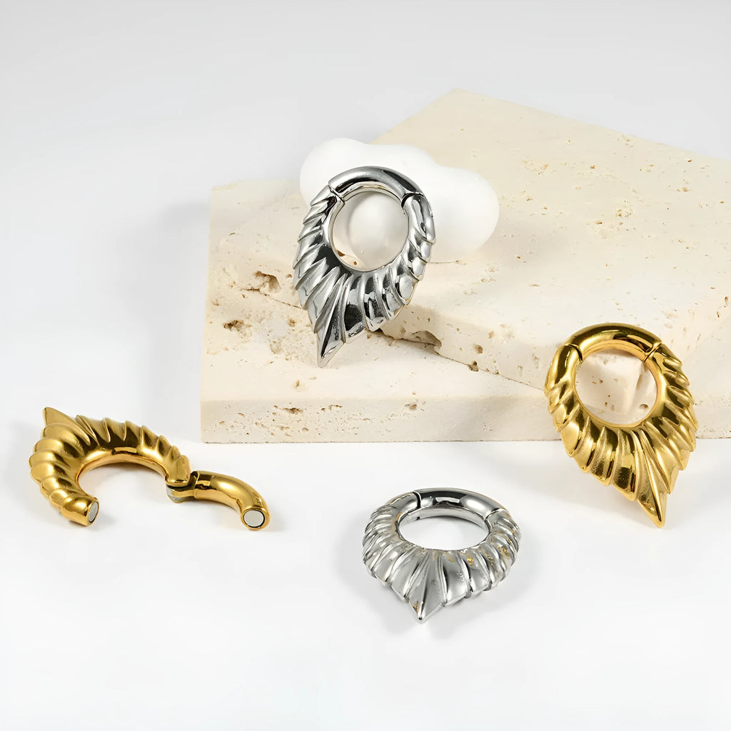 Stainless steel drop-shaped auricle ear extender with round hanging egg and totem design