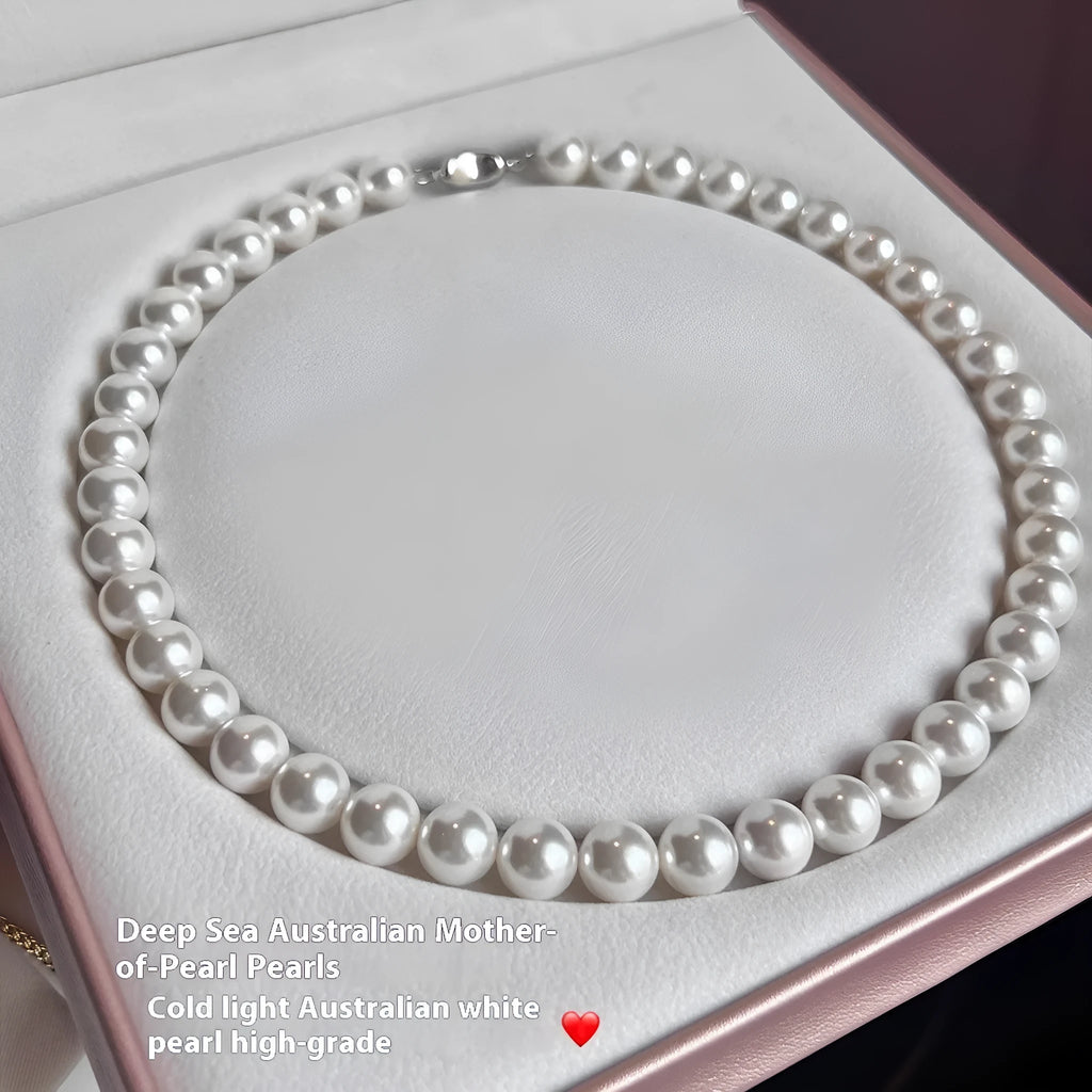 925 silver ingot buckle necklace with Australian white shell pearls on a model, unisex clavicle chain style