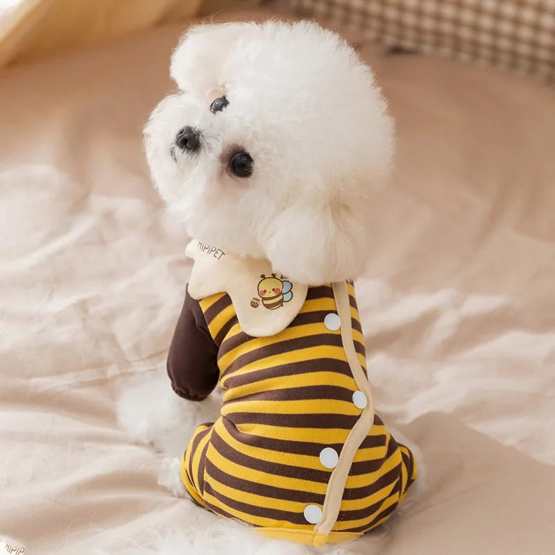 Yellow bee-patterned dog pajamas on small dog, four-legged full coverage suit with lapel collar