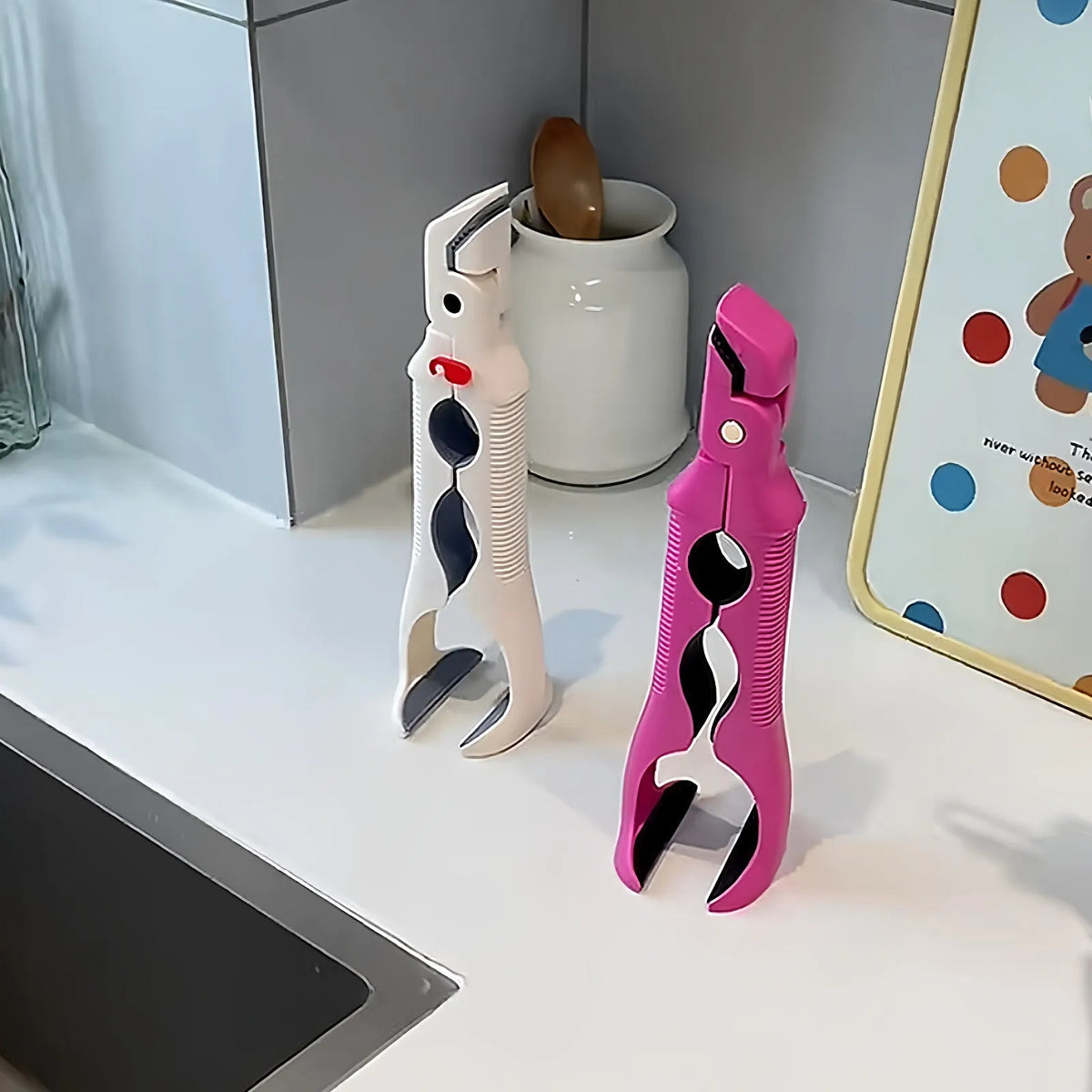 Three-in-one anti-scald clip for bowls and plates with bottle opener, non-slip, shown in Red, Rose Red and White
