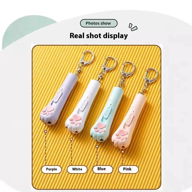 Cat charging pen light toy with feather attachment in cream white, pink, or sky blue colour