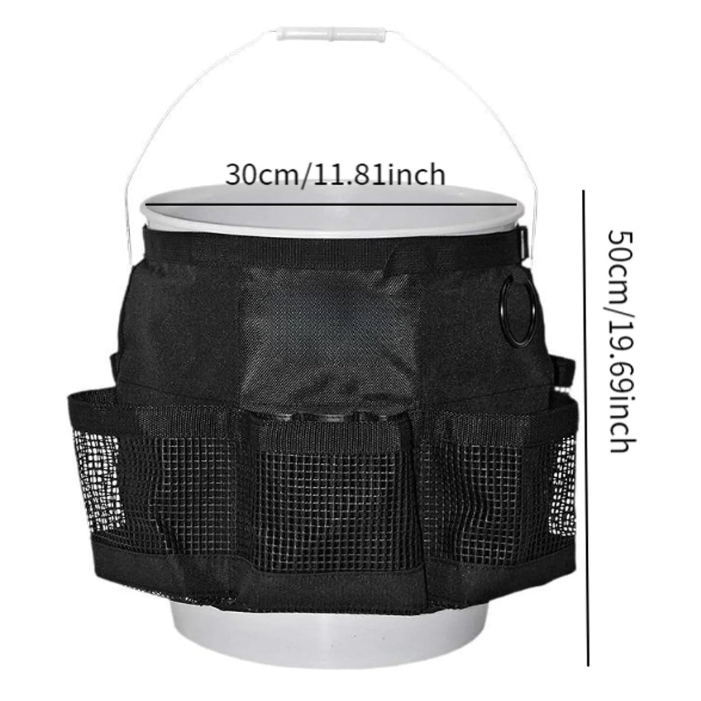 Black cylindrical buggy storage bag hanging from a 5 gallon barrel with car washing tools inside