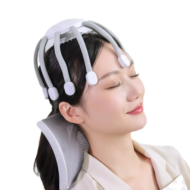 Black handheld electric head massager with multiple claws on a white background.