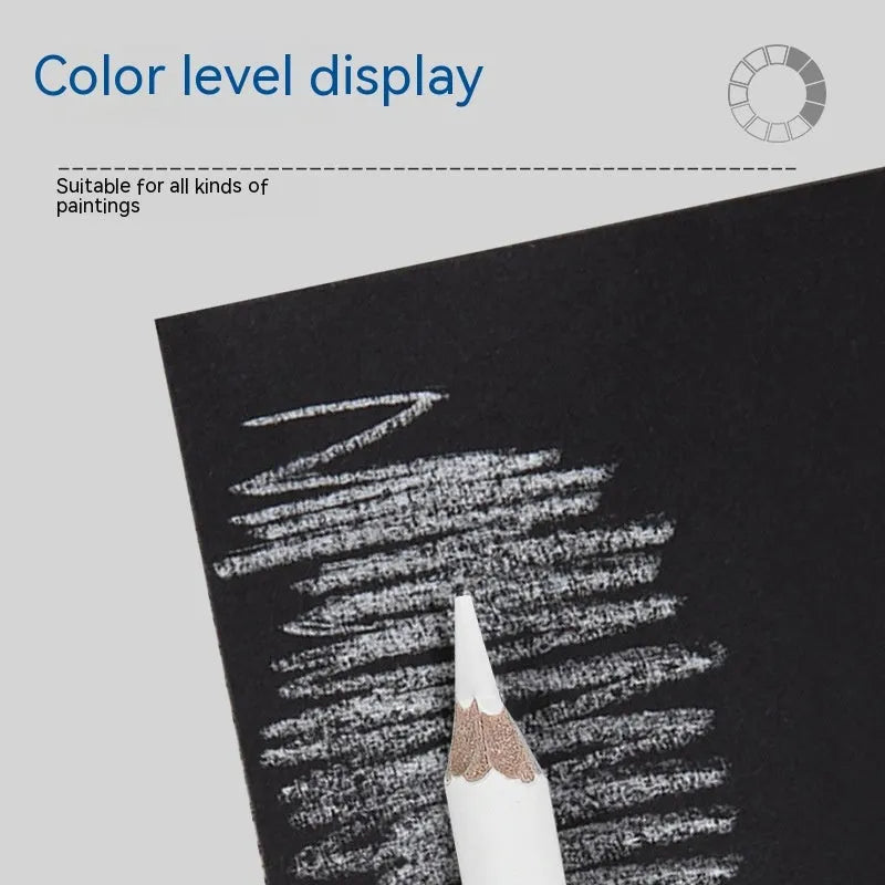 Three white charcoal pencils for sketching on dark paper with highlighting effect