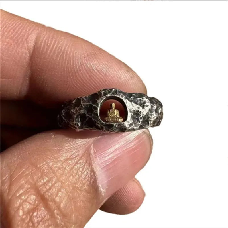 Hand-forged copper Buddha ring with grotto rock texture, retro style, shown on a finger.