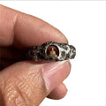 Hand-forged copper Buddha ring with grotto rock texture, retro style, shown on a finger.
