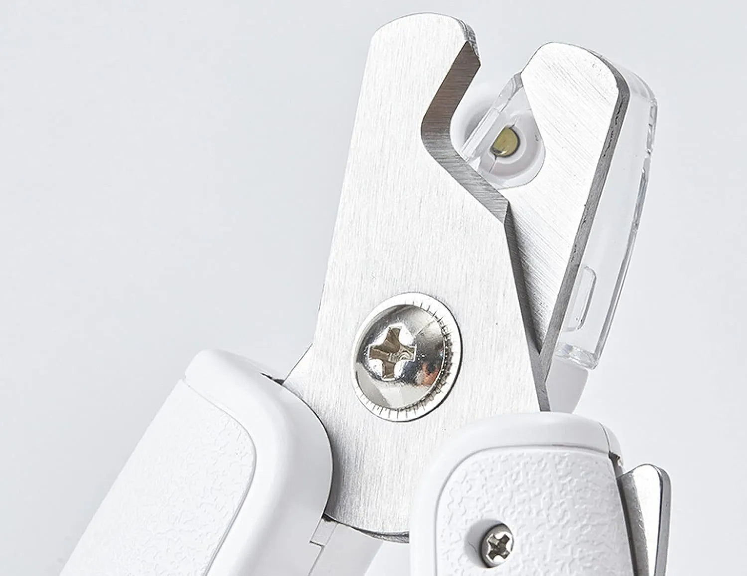 White LED pet nail clipper with transparent splash guard and triangular blade for cats and dogs