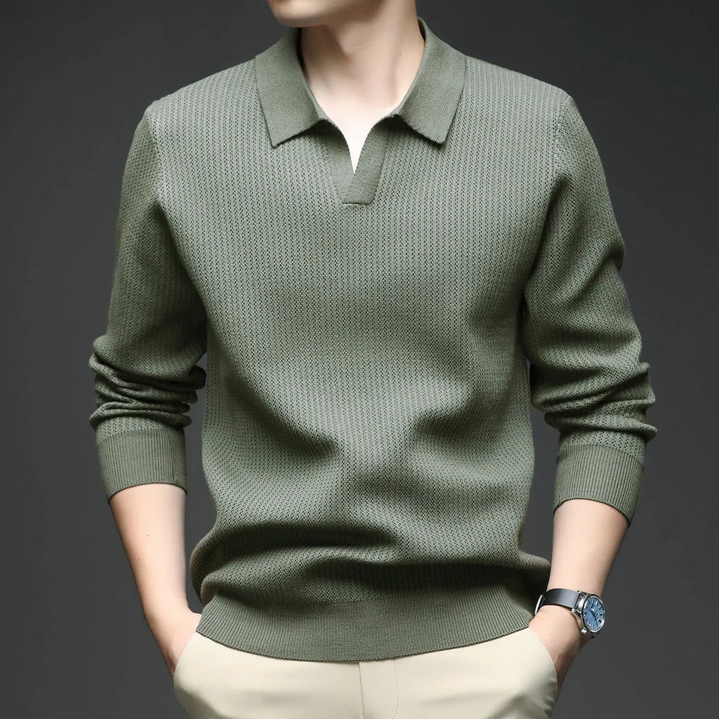 Man wearing a loose fit green casual pullover sweater, autumn casual style